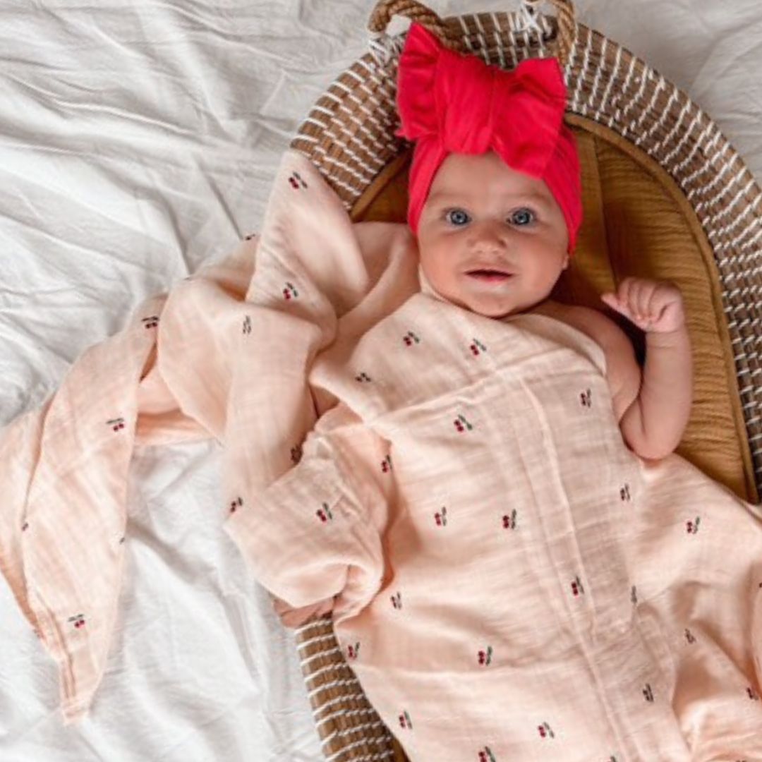 Organic Cotton and Bamboo Cherry Blossom Swaddle for babies. Size 120cm by 120cm. Comfort for babies front view