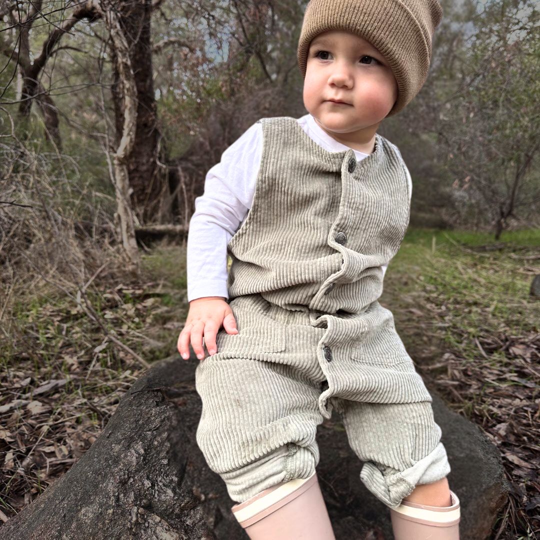 romper in colour sage made from organic cotton corduroy clothing for babies and infants