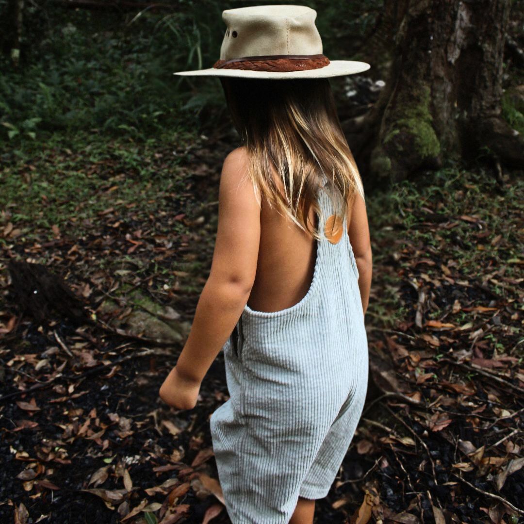 short leg overall, dungaree in colour sage made from organic cotton corduroy clothing for infants, toddlers and kids